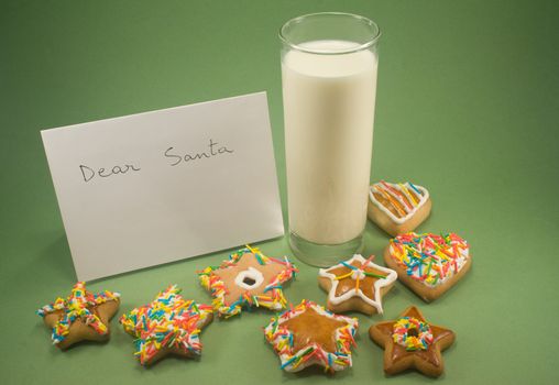 Gifts to Santa isolated on green paper
