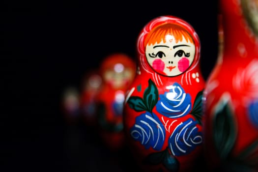 Russian national babushka matroschka on black background