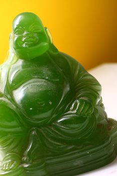 Jade statue of a laughing fat buddha