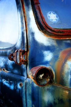 An old Chevrolet that I found at the side of a road. I like the texture of the rust in the photo.