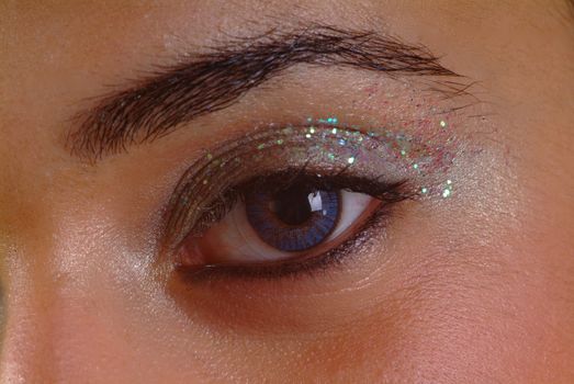 right eye open with glitter eyeshadow