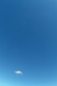 lonesome cloud on blue sky