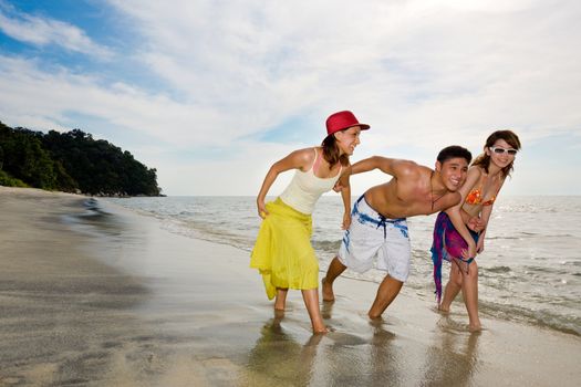 group of friends have fun holiday by the beautiful beach