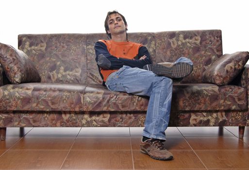 young casual man portrait in a sofa