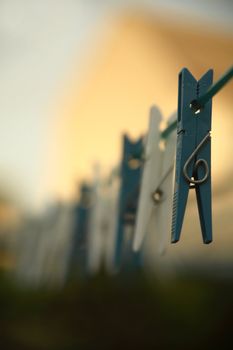 Clothes pegs on a clothes line. (Shallow DOF)
