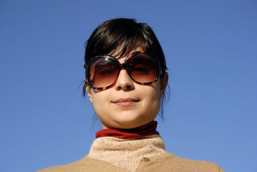 young casual girl portrait in the sun light