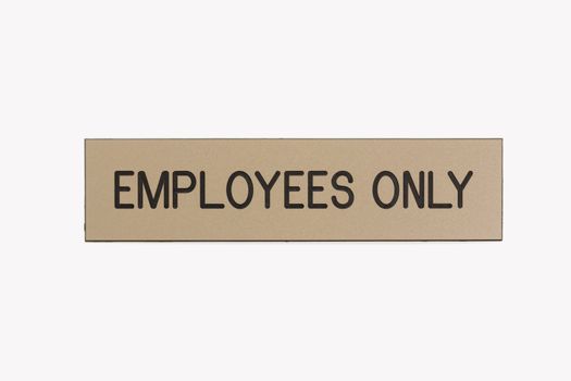 Employees only sign on white background.