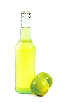 A bottle of lime beer with lime slice on white background
