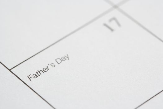 Close up of calendar displaying Fathers Day.