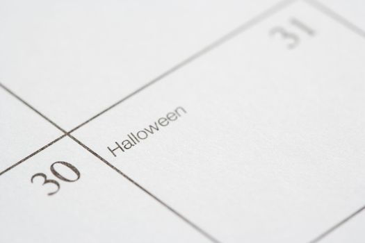 Close up of calendar displaying Halloween.