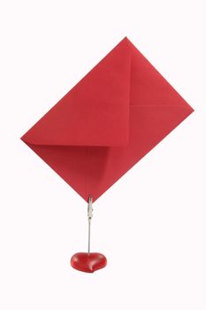 Postit clip holder with red Envelope on white Background.