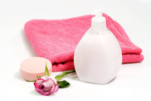 Towel and soap on a bright background