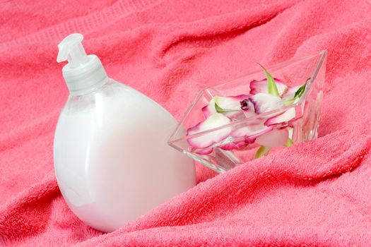Pink towel and soap as background