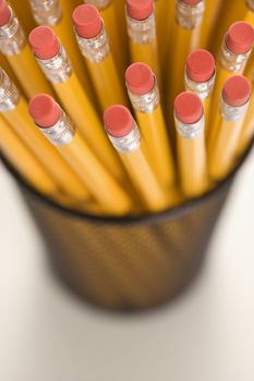 Group of pencils in pencil holder.