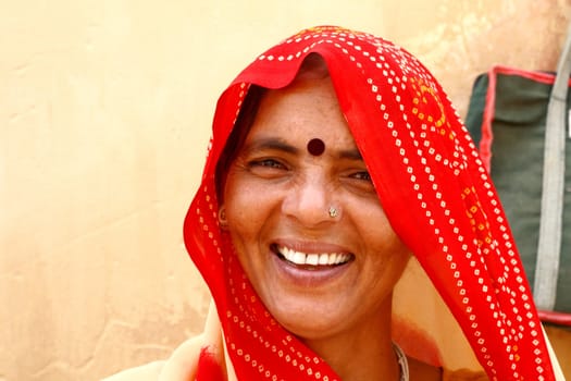 Woman wearing red sari - India