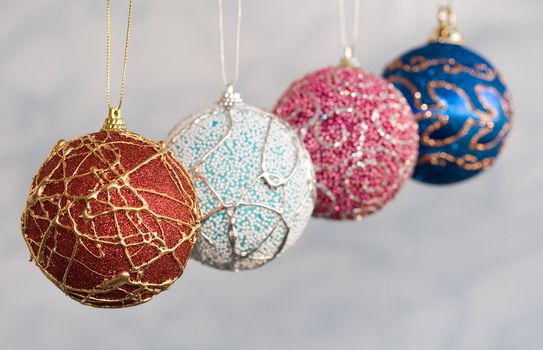 Handicraft christmas balls. Focus on first ball.