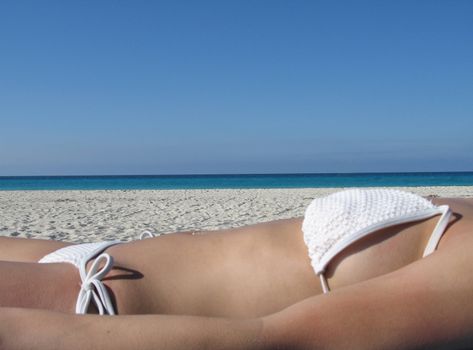 female in a white bikini