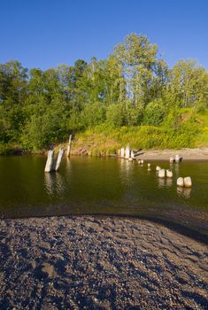 Remains of a pier, dock, or bridge over a river mouth on the North Shore of Lake Superior.