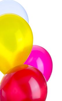 Four balloons in a vertical image with copy space.