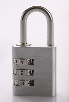 A padlock set to a combination of 1, 2, 3 locked on a white background