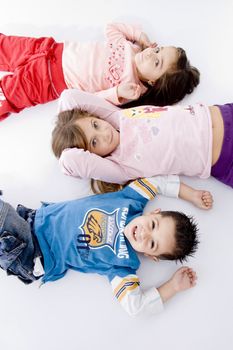 laying cute children with white background