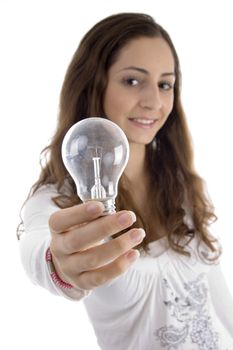 young female showing light bulb isolated on white background