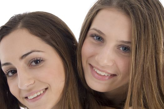 close up of young female friends isolated with white background