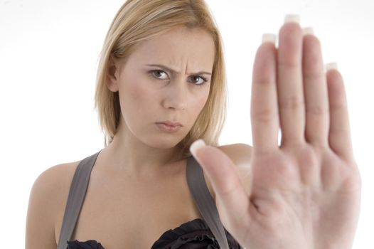 angry woman showing stopping gesture on an isolated white background