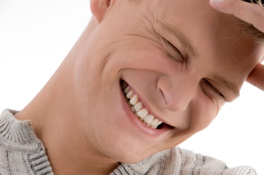 close up of smiling handsome man with white background