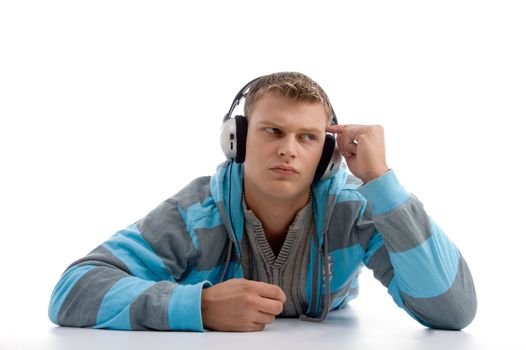 thinking young man with headphone on an isolated background