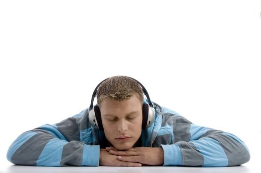 sleeping man with headphone on an isolated background