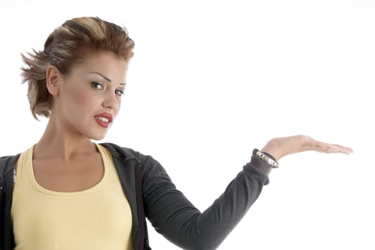attractive woman with open palm on an isolated background