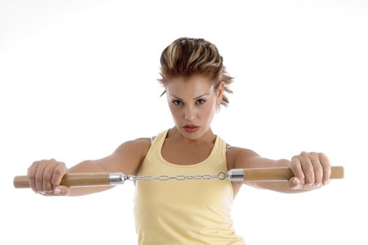 woman with nunchaku with white background