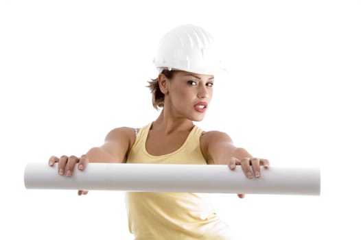 young woman with architect helmet and blue prints on an isolated white background