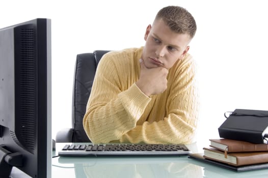 thinking man while looking on screen on an isolated background