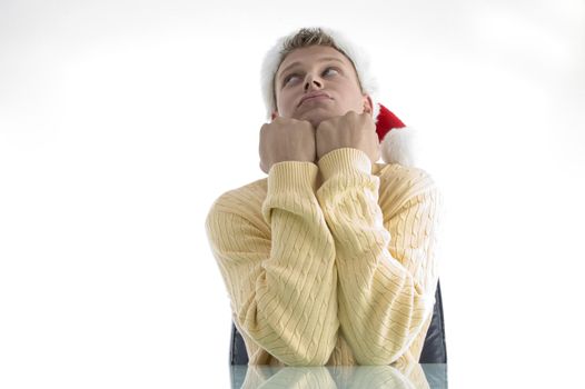 sad man wearing christmas hat with white background