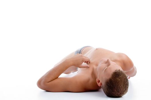 laying muscular man with white background