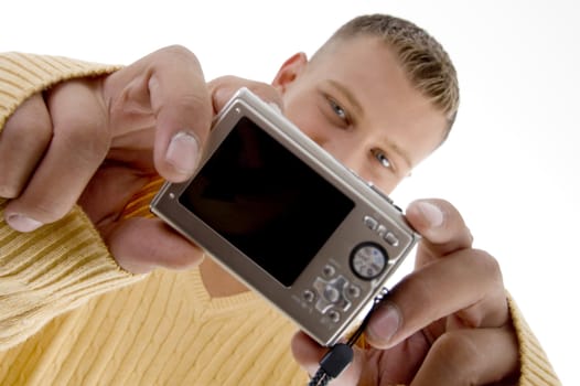 male showing digital camera on an isolated white background