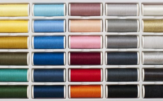 Colorful Spools of sewing thread.