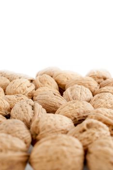 Food background, macro shot of a group of walnuts