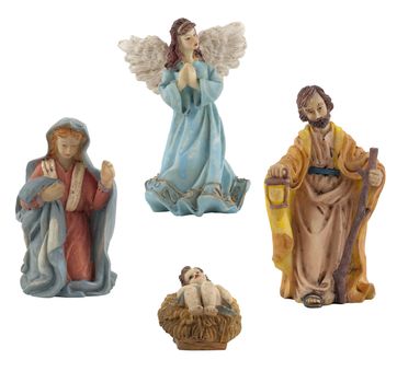 Four ceramic isolated on white statuettes representing Jesus, Mary, Joseph and the Angel