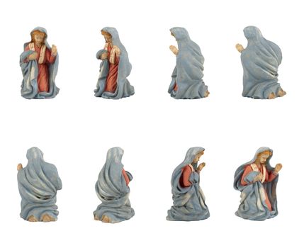 Christmas crib isolated on white statuettes representing Mary.