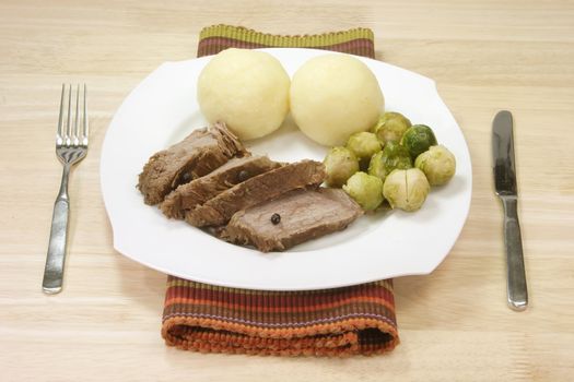 Roasted beef with potatoe dumbling and brussel sprouts