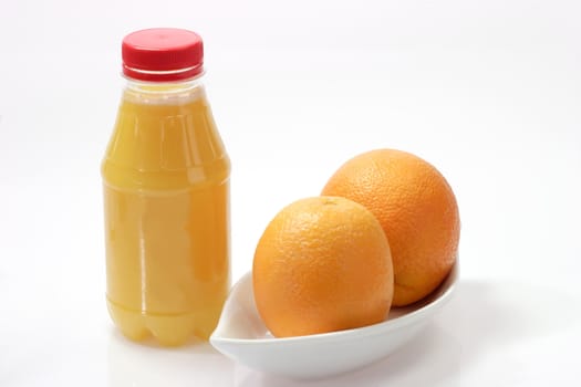Orange juice on bright background