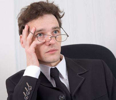 The puzzled young man - businessman in points