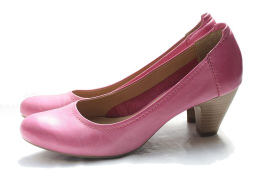 A pair of pink leather ladies shoes