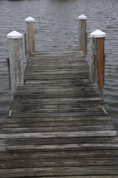 Wooden dock extends into a lake