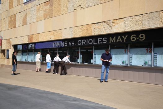 Fans line up at ticket booths for game against the Cleveland Indians at the new outdoor Twin Cities stadium