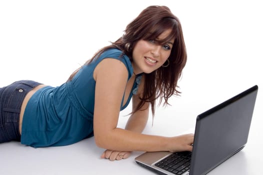 beautiful young female with laptop on an isolated background