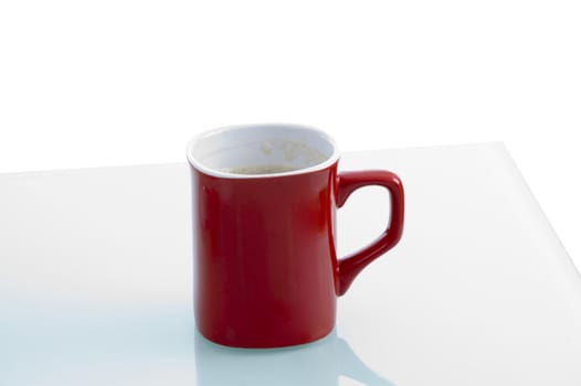 red coffee mug with white background